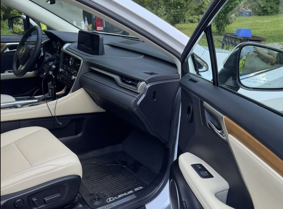 Freshly detailed Subaru interior with cleaned dash and seats