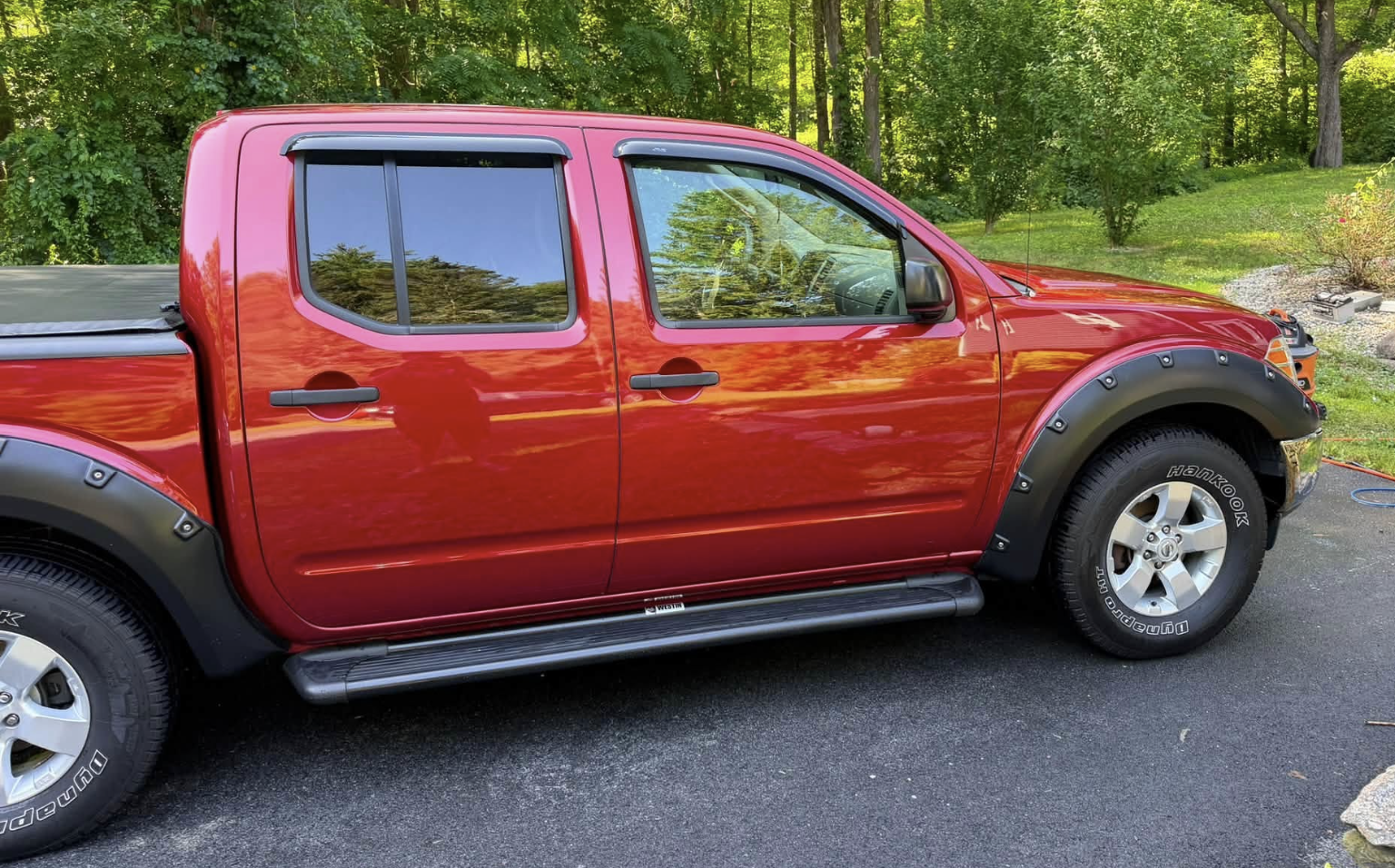 Auto detailing in Cranston, RI with Rubino Auto Detailing, a red truck cleaned and protected inside and out